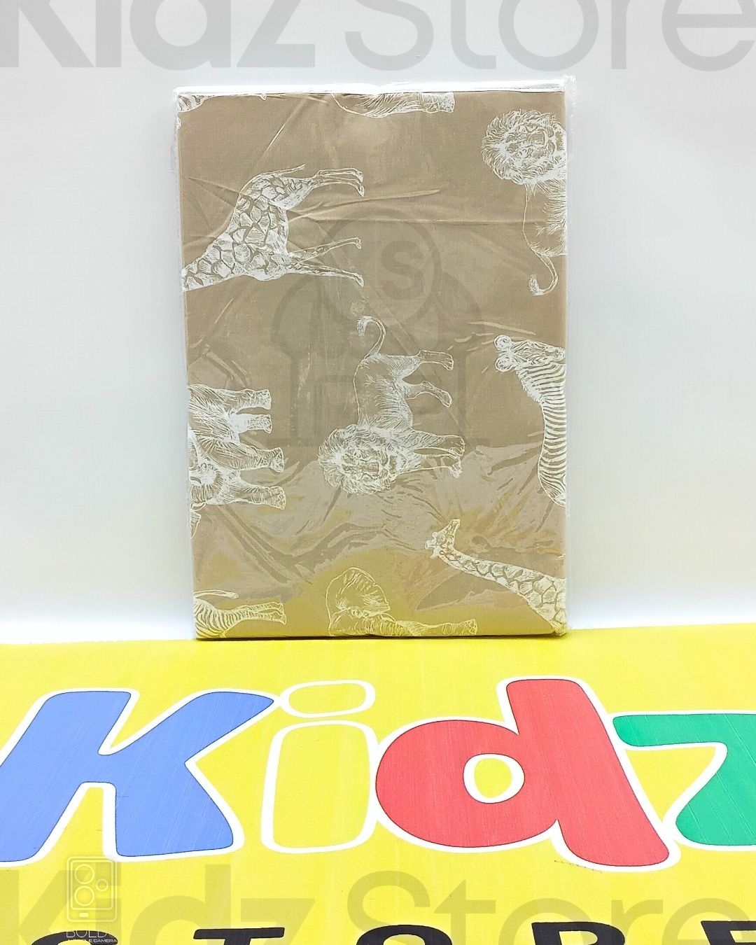 Packaged product with animal illustrations on a white background, featuring 'Kidz' branding.