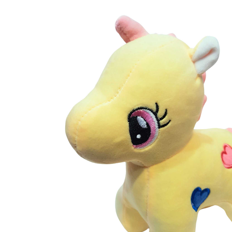 Yellow plush toy with a heart on a white background