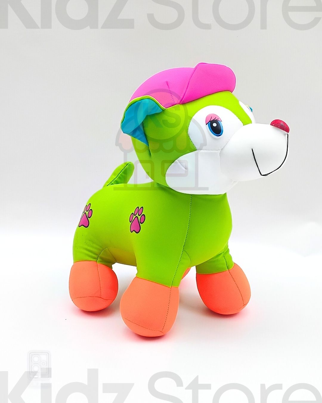 Colorful plush toy dog with a pink hat on a white background, branded 'Kidz Store'.