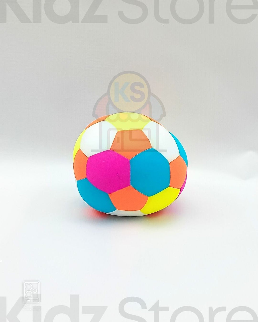 Colorful geometric ball on a light gray background with 'Kidz Store' branding.
